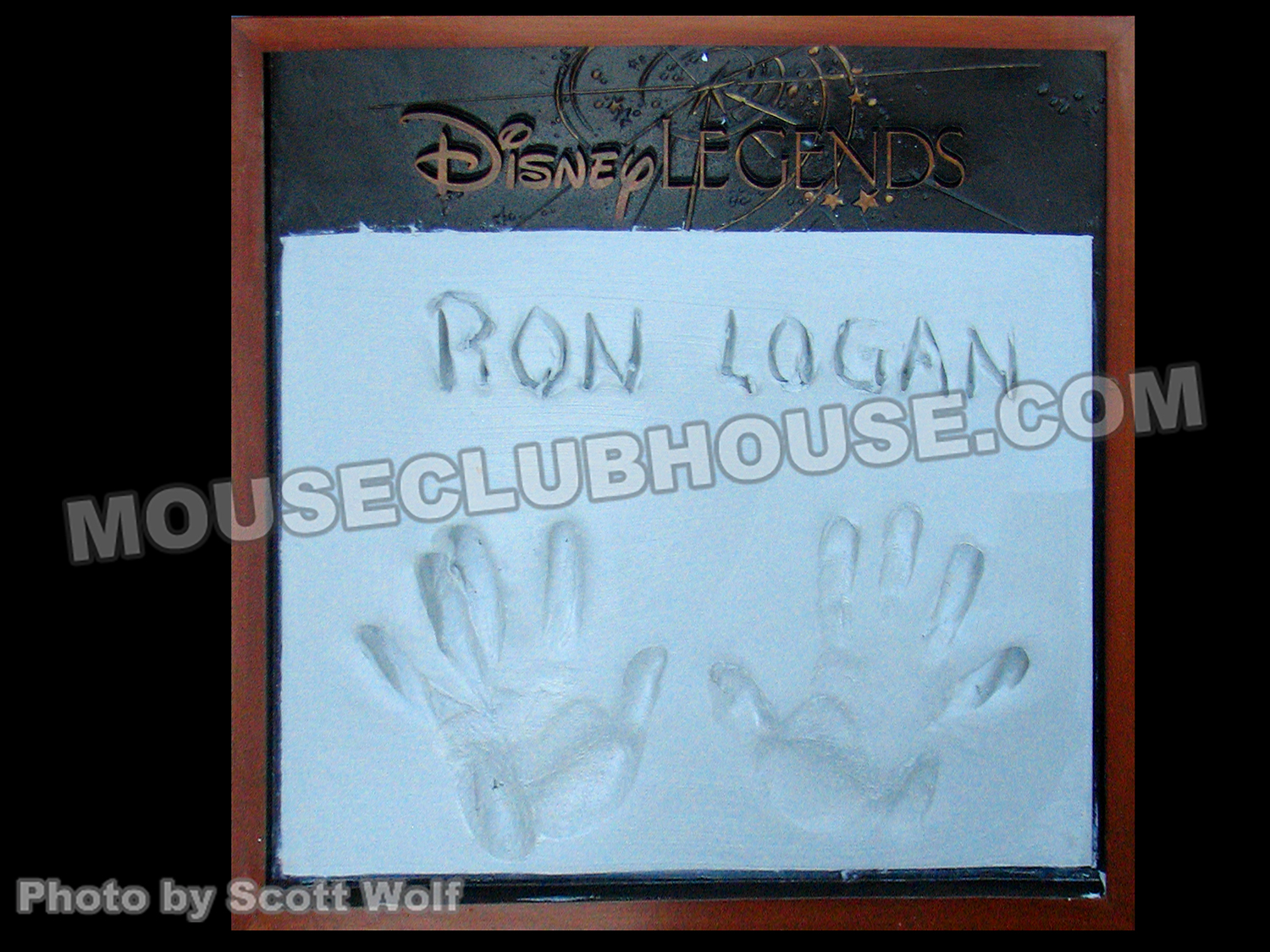 Ron Logan's fresh handprints in cement after receiving his Disney Legends award